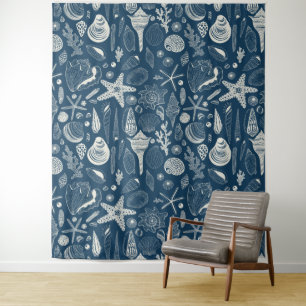 Sea shells on dark blue tapestry