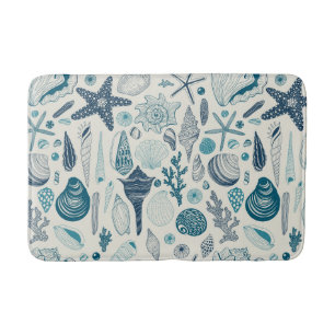 Sea shells on  off white bath mat