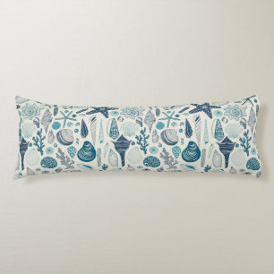 Sea shells on off white body cushion