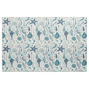 Sea shells on off white fabric