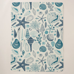 Sea shells on  off white sherpa blanket