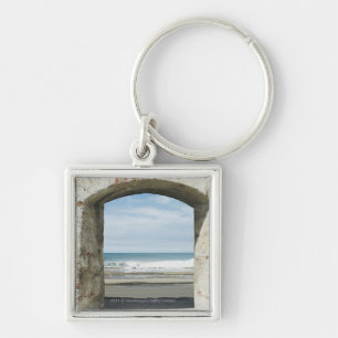 Sea viewed from an archway key ring