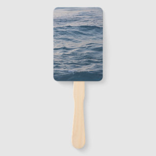Sea water closeup hand fan