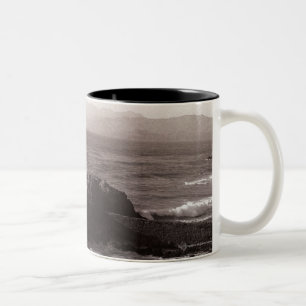 Sea waves crashing against rock Two-Tone coffee mug
