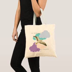 Seagull in the clouds tote bag