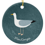 Seagull Personalised Ceramic Ornament<br><div class="desc">A fun seagull standing by the deep green ocean. Perfect for those who love sassy birds and the coast.  Original art by Nic Squirrell. Change the name to personalise.</div>