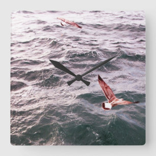 SEAGULLS FLYING OVER THE SEA WAVES SQUARE WALL CLOCK