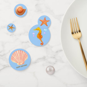 Seahorse, shell, stars & pearl on light blue table confetti