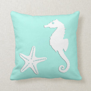 Seahorse & starfish - white on pale aqua cushion