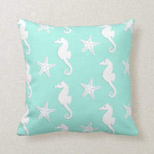 Seahorse & starfish - white on pale aqua cushion