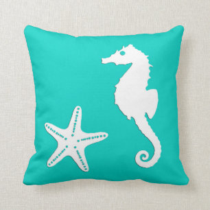 Seahorse & starfish - white on turquoise cushion