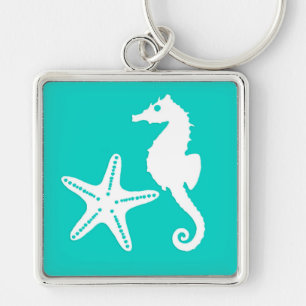 Seahorse & starfish - white on turquoise key ring