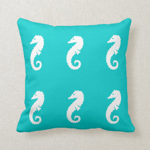 SEAHORSE WHITE on blue pillow
