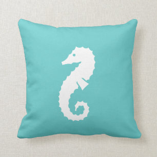 SEAHORSE WHITE on teal blue pillow