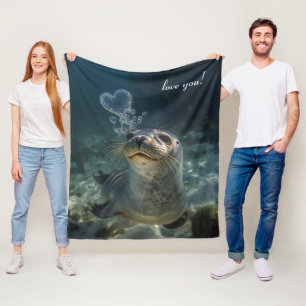 seal blowing heart bubbles fleece blanket