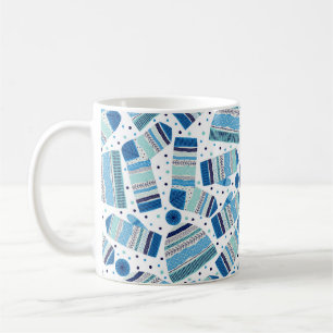 Seamless pattern. Knitted mittens, caps and wool s Coffee Mug