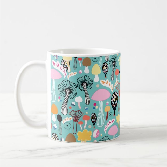 seamless pattern of colourful mushrooms on a green coffee mug (Left)
