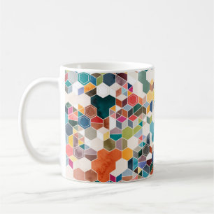 Seamless pattern of hexagons in random colours in coffee mug