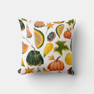 Seamless pattern of pumpkins and leaves on an isol cushion