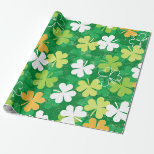 Seamless pattern of scattered clovers and shamrock wrapping paper