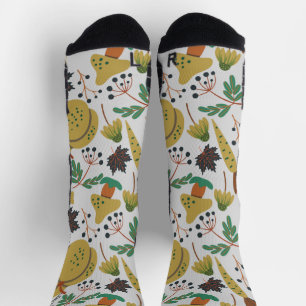 Seamless pattern of tropical pumpkins and carrots socks