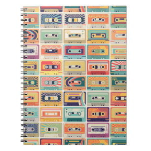 Seamless pattern with audio cassette tapes in a re notebook