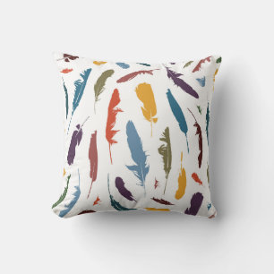 Seamless pattern with colored feathers on a light. cushion