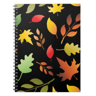 Seamless pattern with fallen autumn leaves and col notebook