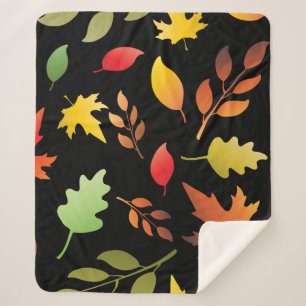 Seamless pattern with fallen autumn leaves and col sherpa blanket