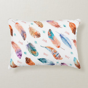 Seamless pattern with hand drawn feathers on white decorative cushion