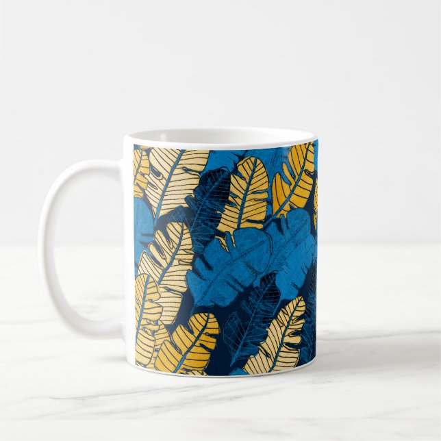 Seamless pattern with hand drawn tropical leaves.  coffee mug (Left)