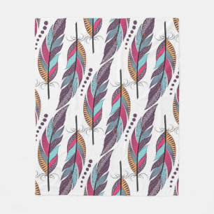 Seamless pattern with large coloured feathers and fleece blanket