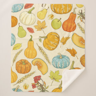 Seamless pattern with pumpkins, autumn leaves, app sherpa blanket