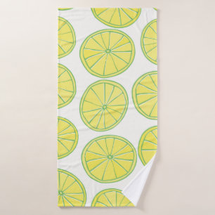 Seamless pattern with yellow lemon slices on white bath towel