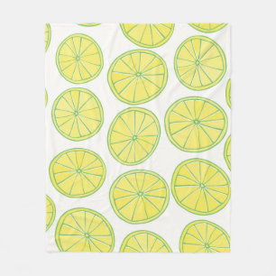 Seamless pattern with yellow lemon slices on white fleece blanket