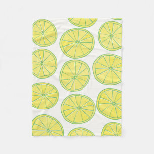 Seamless pattern with yellow lemon slices on white fleece blanket