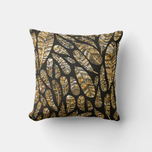 Seamless texture pattern of glowing golden feather cushion