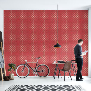 Seamless white polka dot pattern on red background wallpaper