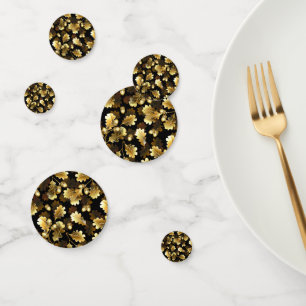 Seamless with golden oak branches on black confetti