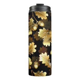 Seamless with golden oak branches on black thermal tumbler