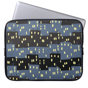 Seanless pattern with a city at night. laptop sleeve
