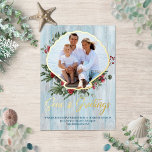 Seas N Greetings Seashell Christmas Photo Gold Foil Holiday Card<br><div class="desc">Add your own family photo to customise this coastal seashell Christmas card, wishing family and friends a warm beachy Christmas with “Seas & Greetings” in a handwritten brush script font printed with real gold foil. The photo is framed in gold foil by a scallop shell, and decorated with Christmas botanical...</div>