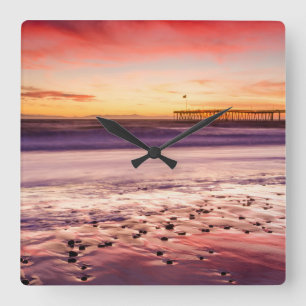 Seascape and pier at sunset, CA Square Wall Clock