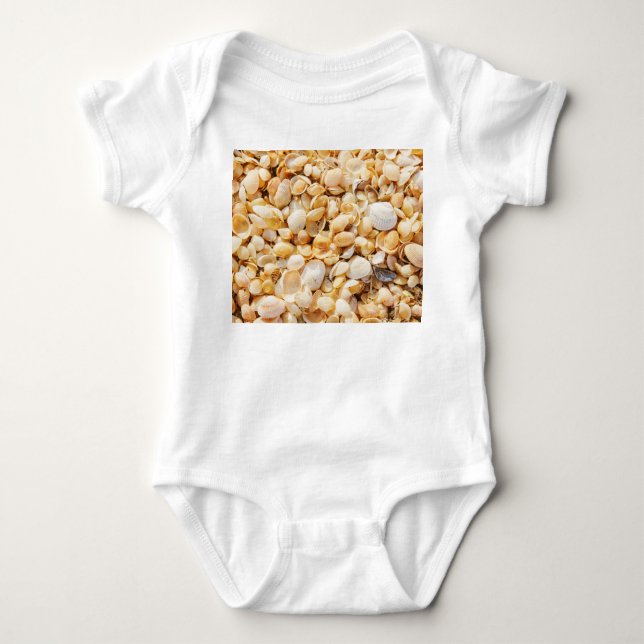 Seashell textured summer beach background. baby bodysuit (Front)