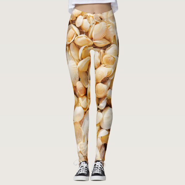 Seashell textured summer beach background. leggings (Front)
