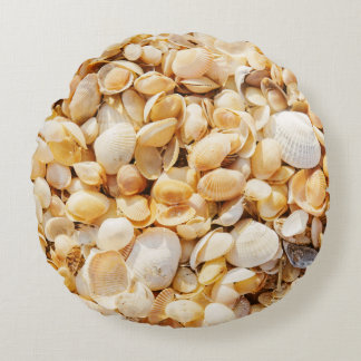 Seashell textured summer beach background. round cushion
