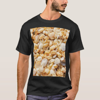 Seashell textured summer beach background. T-Shirt