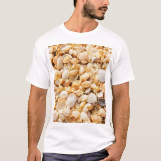 Seashell textured summer beach background. T-Shirt