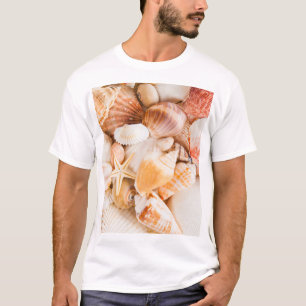 Seashells background: marine theme. T-Shirt