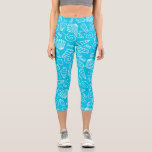 Seashells Pattern on Bright Blue Capri Leggings<br><div class="desc">Bright blue leggings with white seashell stencil pattern.</div>